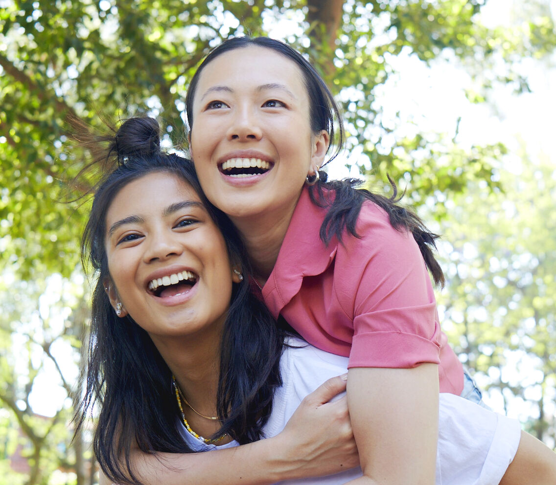 smiling friends piggyback