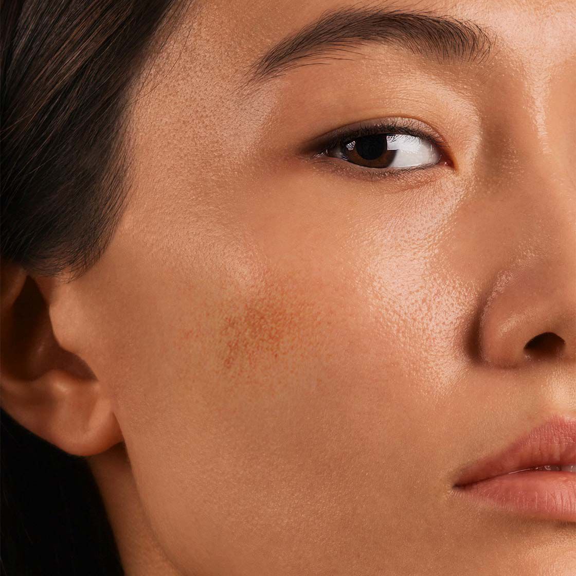 woman touching face